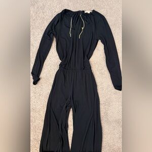 Micheal Kors Black V-Neck Long Sleeve Jumpsuit with gold chain detail
